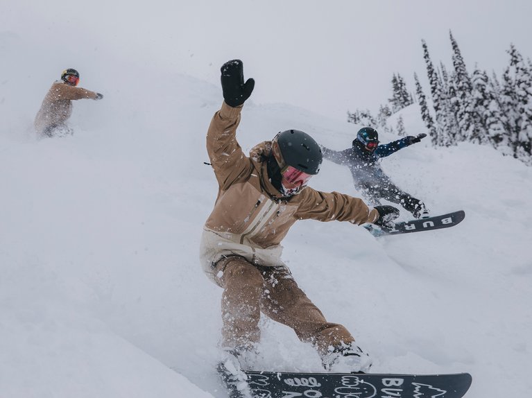 A group of riders in powder