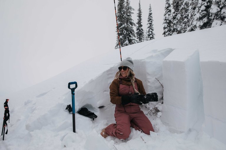 Why You Should Take an Avalanche Safety Course - Digging a Snow Pit