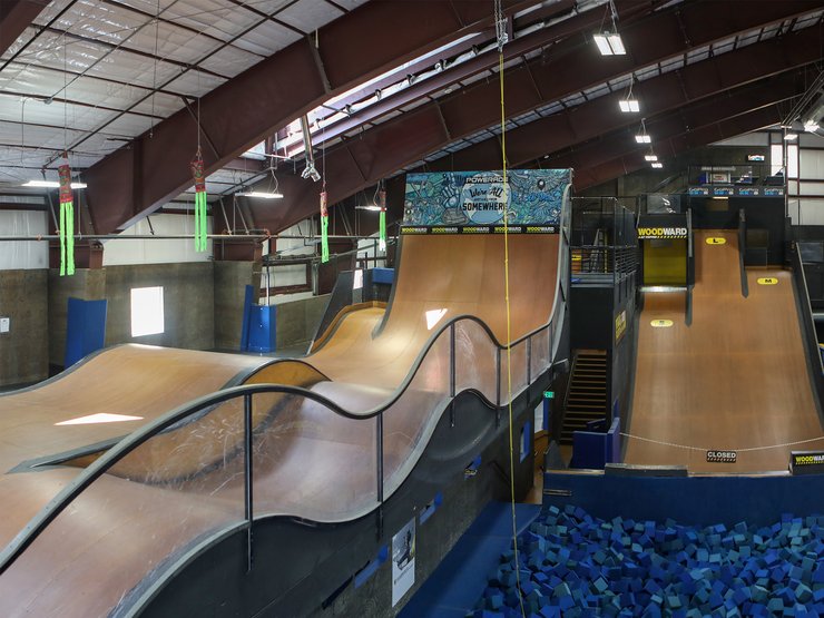 Most camps offer off-snow facilities, like The Barn at Woodward Copper, featuring skate tracks, foam pits...