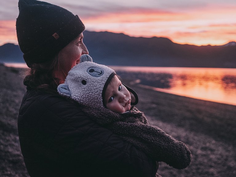Kimmy Fasani and son Koa watching a sunset in New Zealand