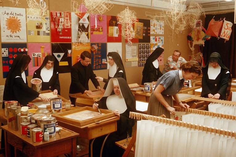 A group of nuns making prints