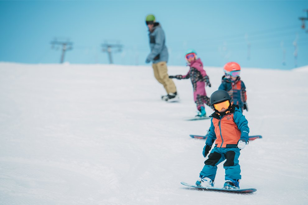 getting-started-teaching-kids-to-snowboard-family.jpg